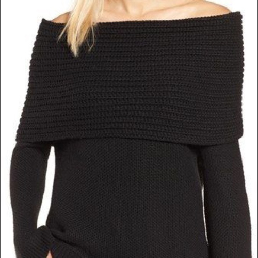 Off-the-shoulder black knit sweater